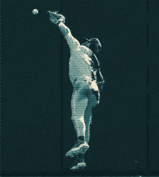 Bryce Harper leaping as the ball clears his glove